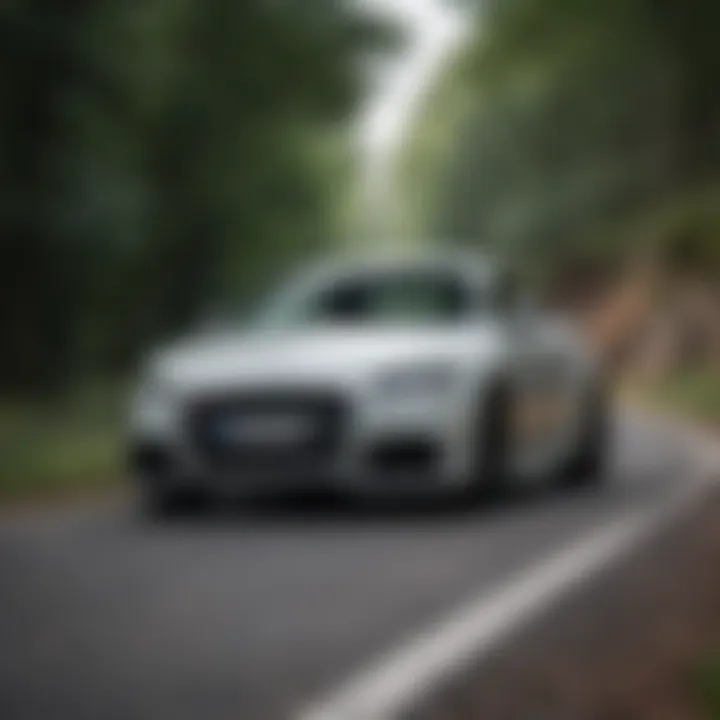 Audi TT Quattro Sport in motion on a winding road