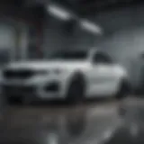 A BMW vehicle in a well-equipped garage undergoing inspection