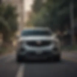Cadillac SUV on an open road showcasing fuel efficiency
