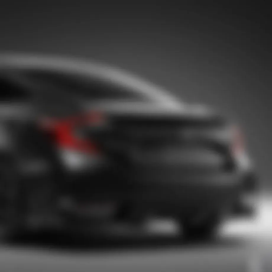 Sleek profile of the all-black Honda Civic Sport showcasing its aerodynamic design.