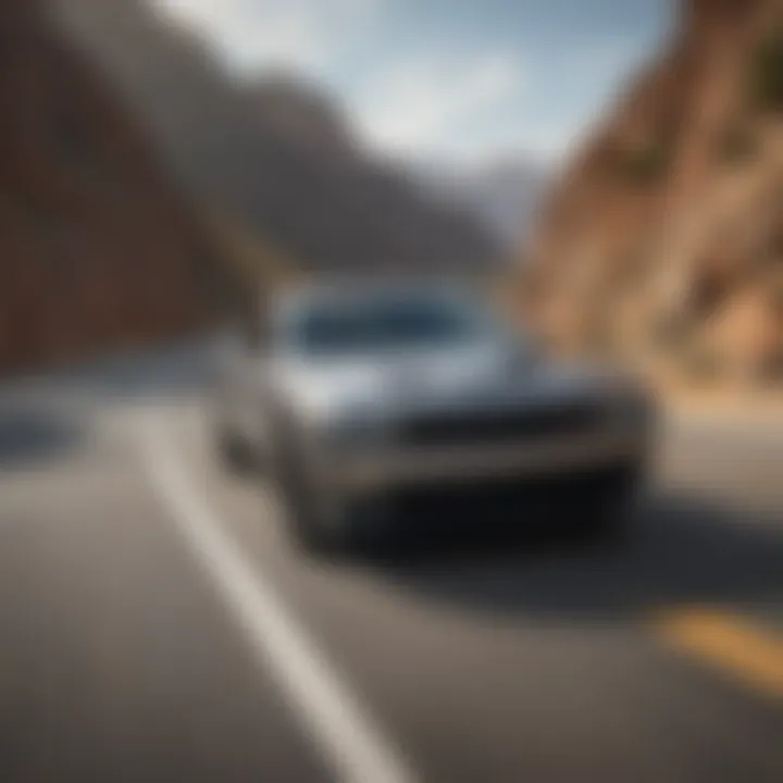 Scenic shot of the 2016 Scat Pack Challenger in motion on a winding road.