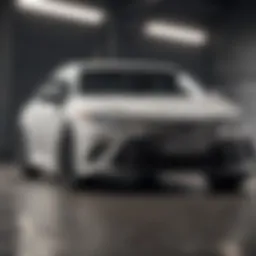 Sleek front view of the all white Toyota Camry showcasing its elegant design.