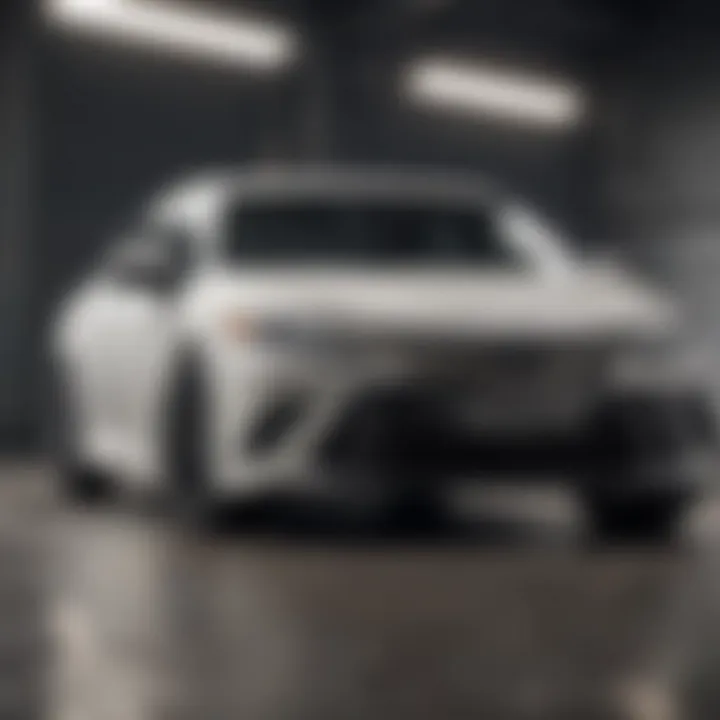 Sleek front view of the all white Toyota Camry showcasing its elegant design.