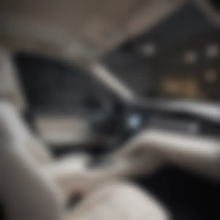 Interior shot of the all white Toyota Camry highlighting its modern features and spaciousness.