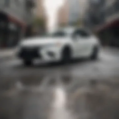 All white Toyota Camry parked in an urban setting showcasing its stylish appearance.
