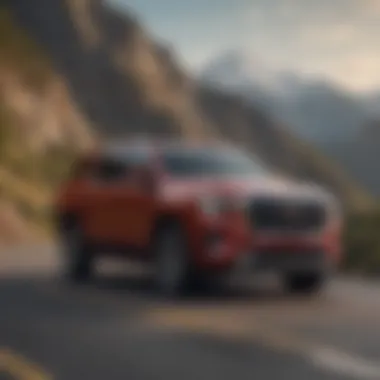 Dynamic performance of the 2021 Denali on a scenic road, illustrating its driving capabilities