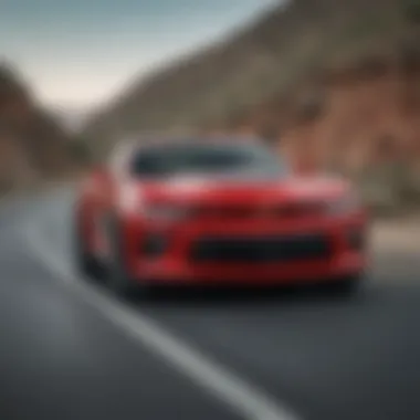 A dynamic shot of a Camaro in motion on a winding road