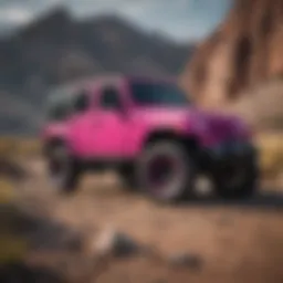 Vibrant hot pink Jeep Rubicon parked in a rugged landscape