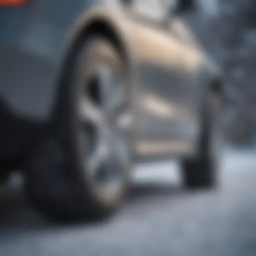 Close-up of a Mercedes vehicle fitted with premium snow tires on a snowy road.