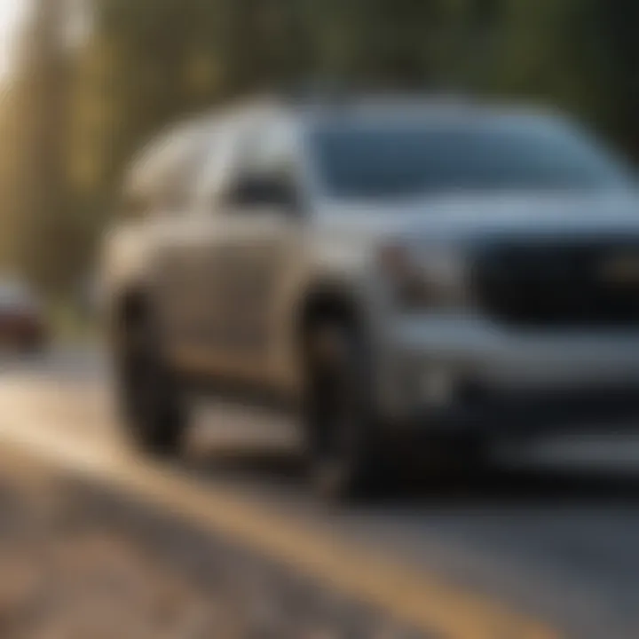 Chevy Tahoe with roof rails carrying outdoor gear