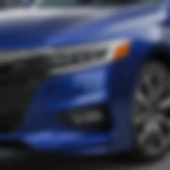 Safety features of the Royal Blue Honda Accord Sport displayed through a close-up of its exterior