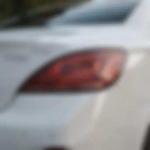 Close-up of a pristine white car's surface showcasing scratches
