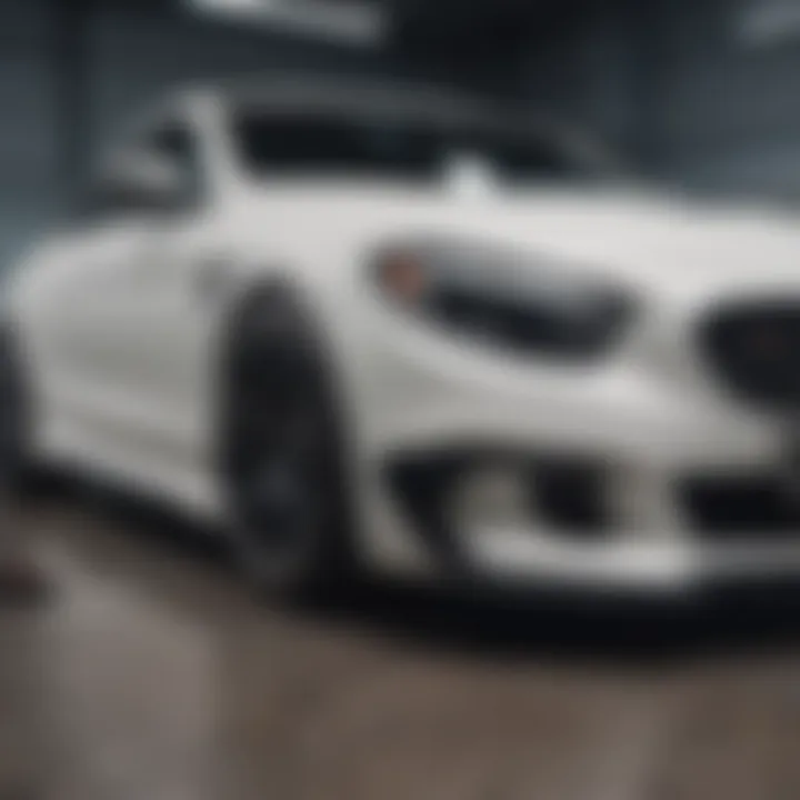 Tools laid out for scratch removal on a white car