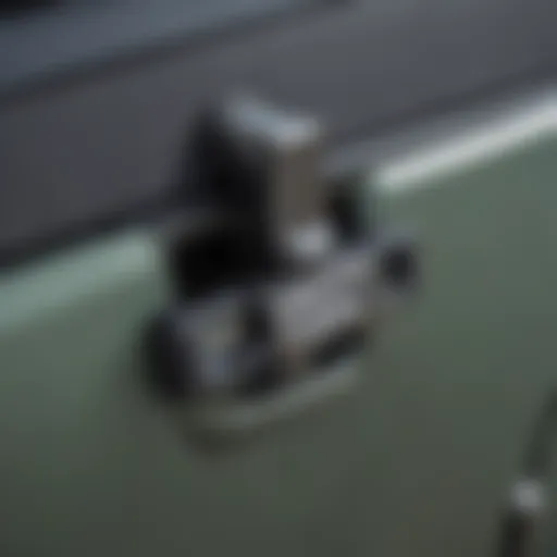 Close-up of a locking hood latch on Jeep Wrangler JK