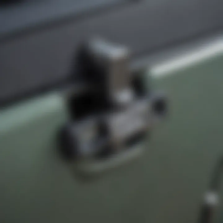 Close-up of a locking hood latch on Jeep Wrangler JK