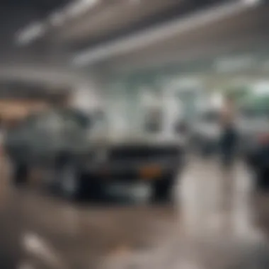 A couple discussing car options in a dealership with a sales representative.