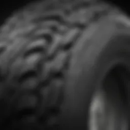 A close-up view of truck tires showcasing different tread patterns and sizes