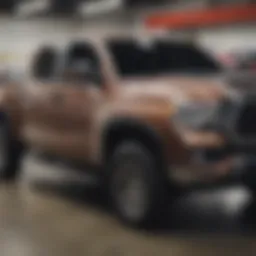 Sleek fiberglass truck bed cover installed on a Toyota truck, showcasing its streamlined design and finish.