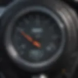 Close-up of a digital tire pressure gauge displaying pressure readings