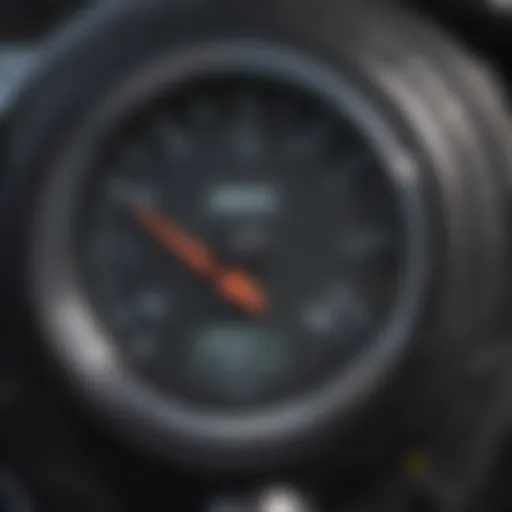 Close-up of a digital tire pressure gauge displaying pressure readings