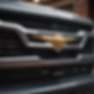 A close-up of a Silverado truck's iconic front grille and logo.