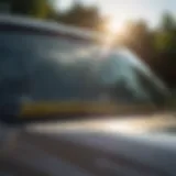 Close-up of a car sun visor with sunlight filtering through