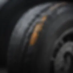 Close-up of tire tread showing depth indicators