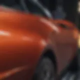 Close-up of a glossy car surface reflecting sunlight after waxing